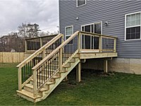 <b>Pressure Treated Wood Deck with Wood Railing and Black Aluminum Balusters</b>